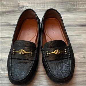 Coach Black Leather Slip-On Loafers with Gold Accents